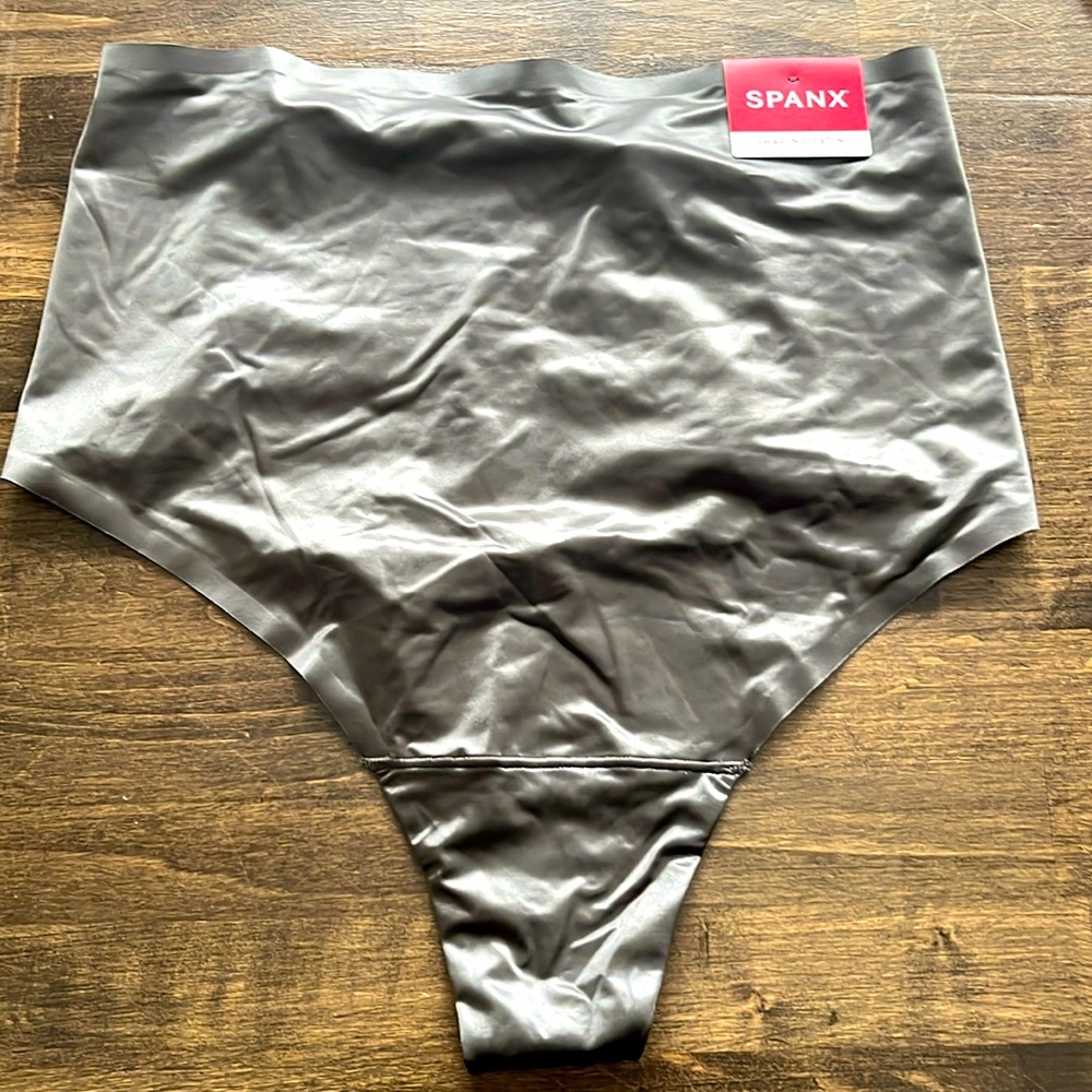 Women’s size XL Spanx Thong in gray satan. New with tags